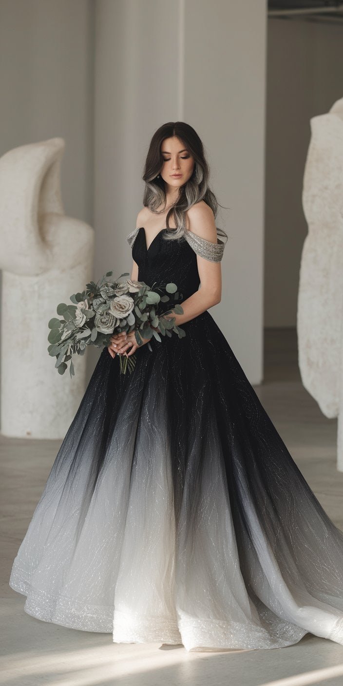 Artistic bride in a black ombré wedding dress with a gradient effect fading to gray.