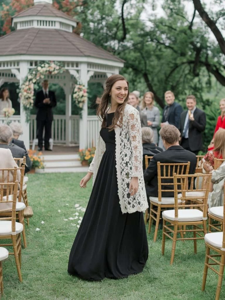 Beautiful Black Tie Wedding Guest Dress in a black maxi style, suitable for elegant outdoor celebrations.
