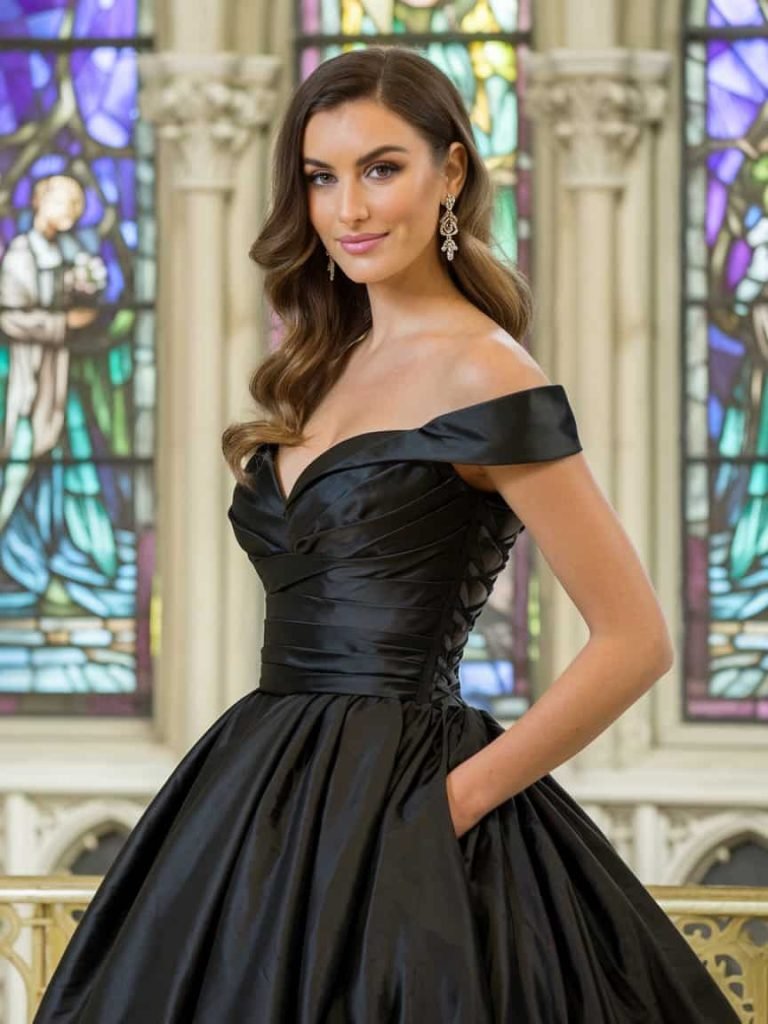 Black Tie Wedding Guest Dress featuring a classic silhouette in rich black silk, perfect for an upscale wedding.