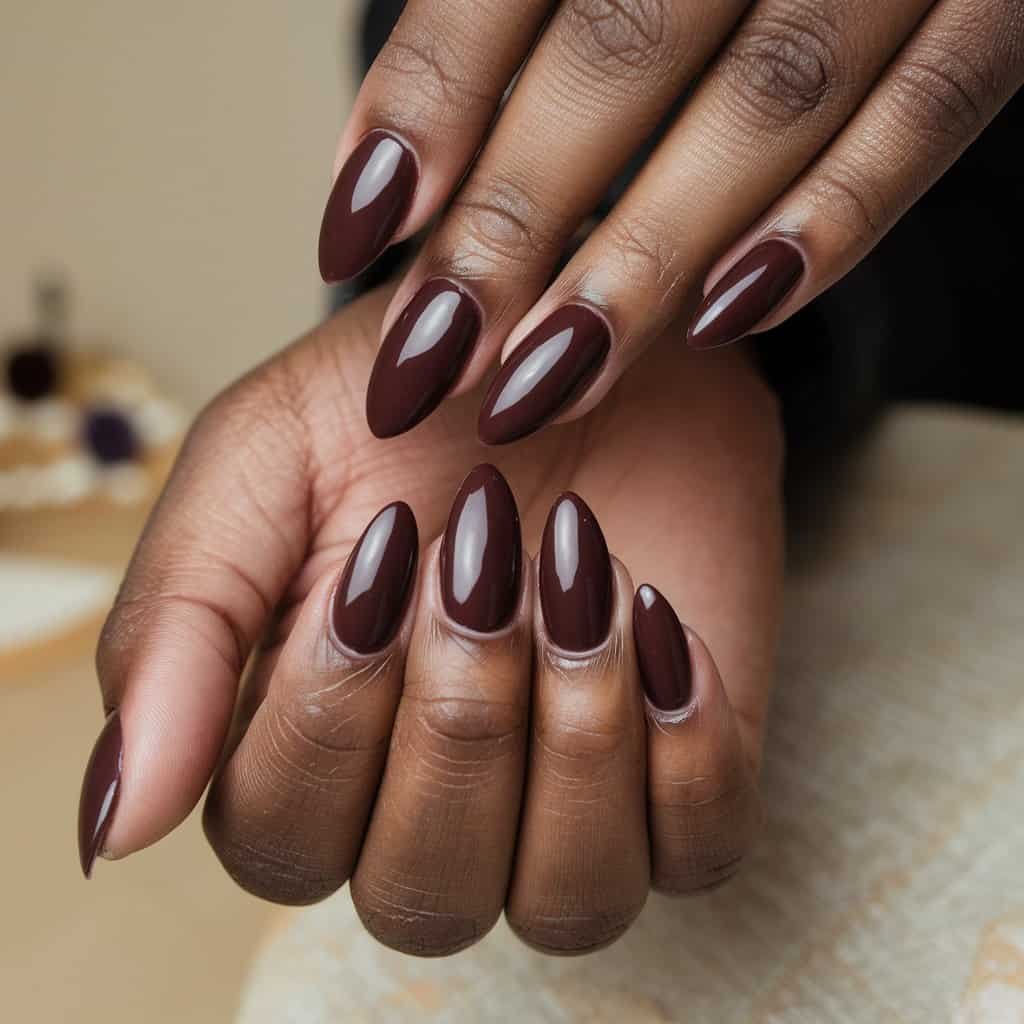 Stylish Rich Chocolate Nude Nail design showcasing an ombré effect that transitions into caramel