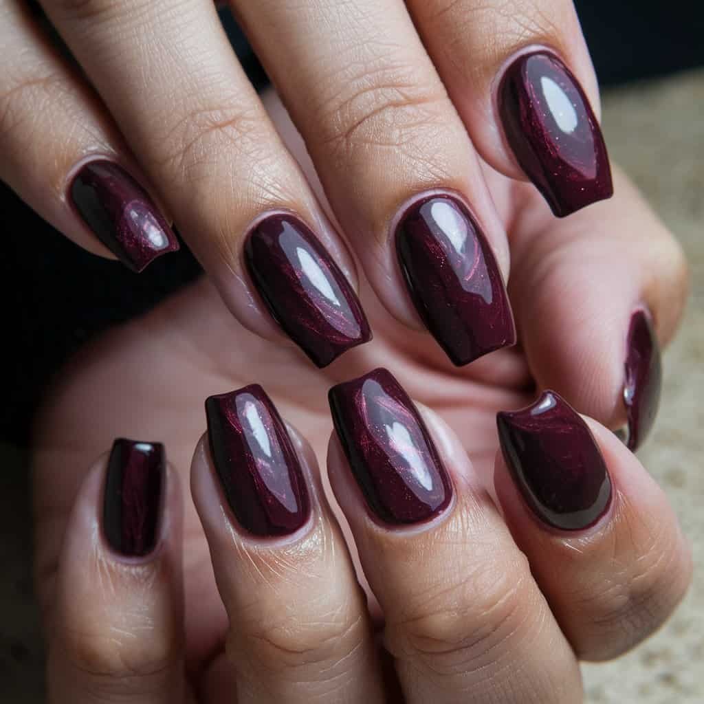 Dramatic Deep Plum Nude Nail design that embodies elegance and sophistication.