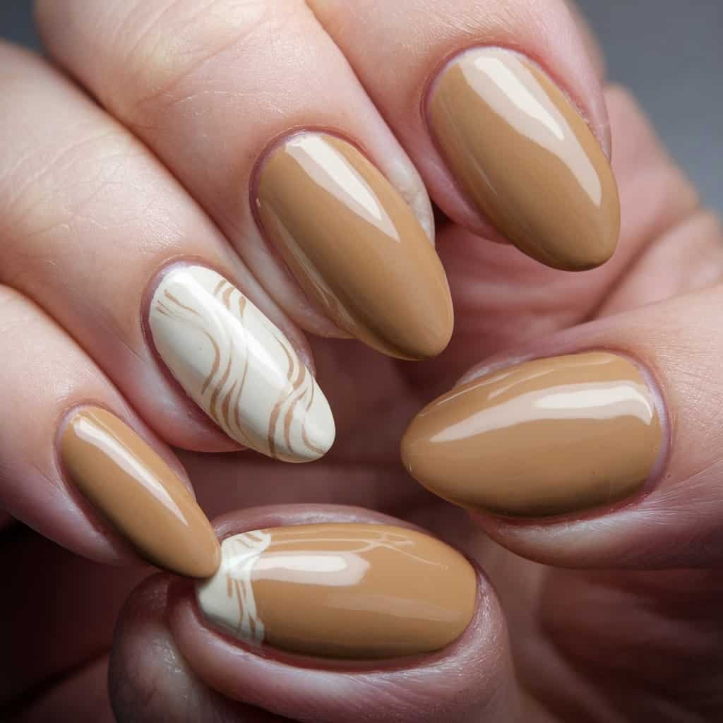 Chic Sandy Tan Nude Nail design that enhances olive skin with a warm, neutral tone.
