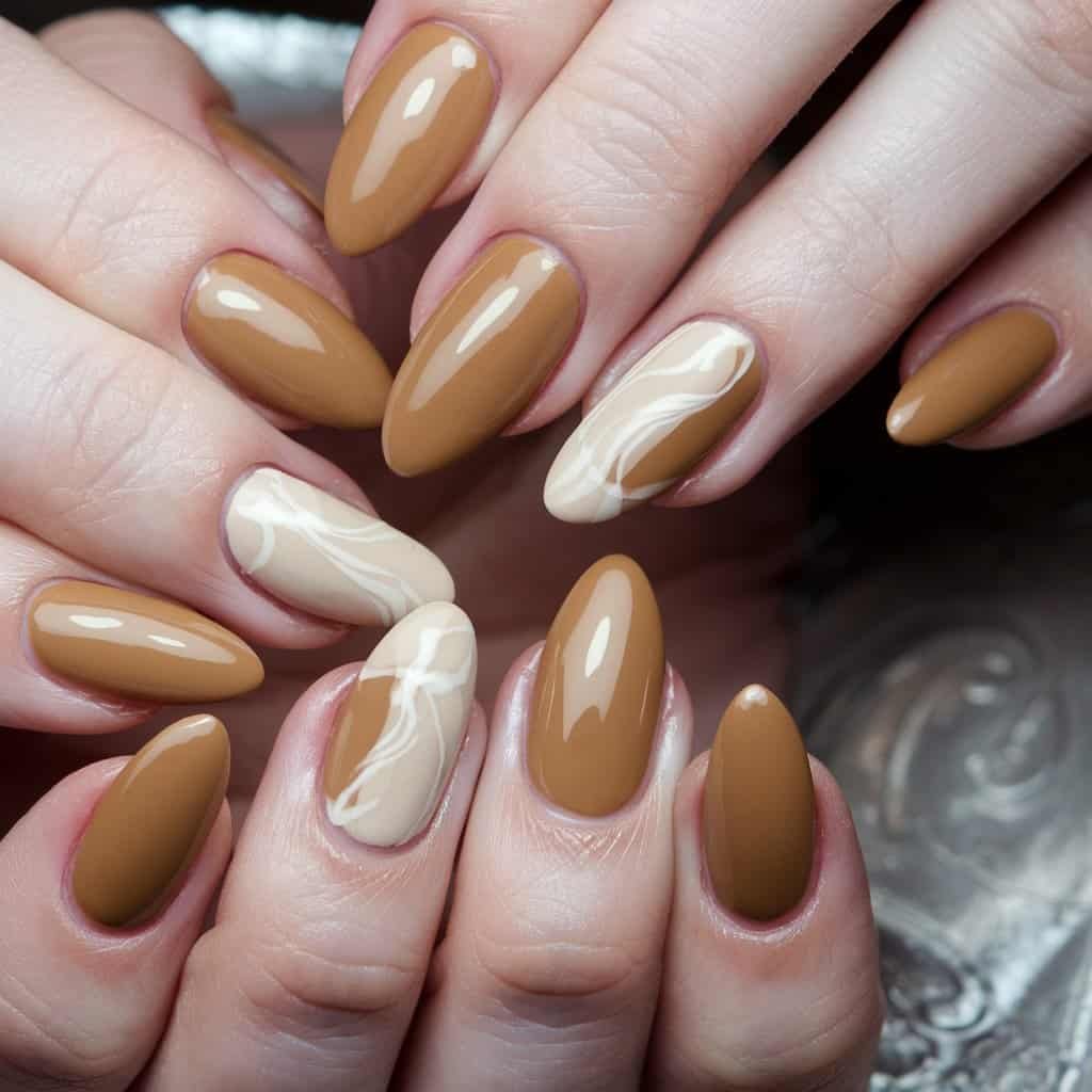 Stylish Sandy Tan Nude Nail manicure in a tapered almond shape, radiating elegance