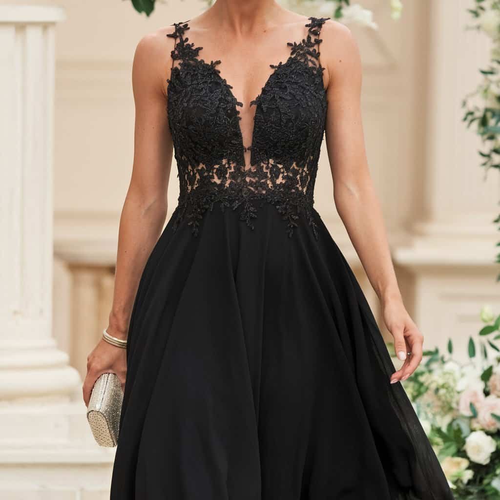 Elegant Black Wedding Guest Dresses: Classic A-Line with Subtle Pleating – A simple yet elegant black A-line dress with subtle pleating, perfect for a sophisticated wedding guest look.
