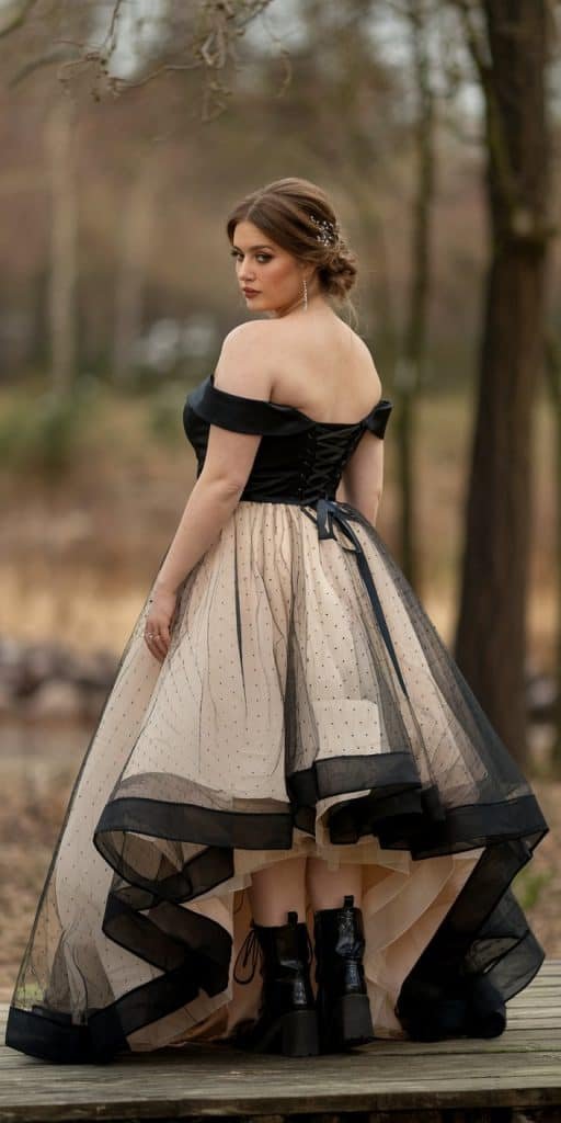Stylish plus size black wedding dress with minimalist design, showcasing natural beauty