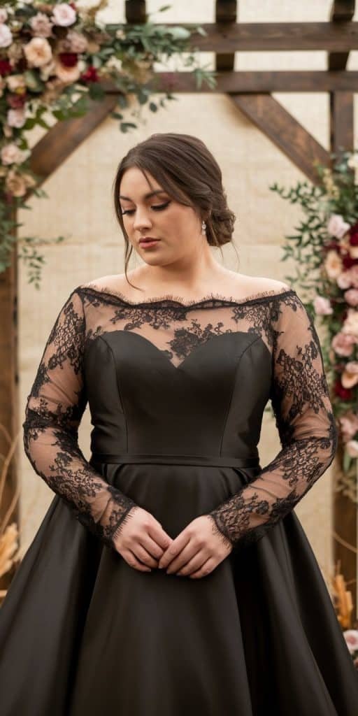 Romantic plus size black wedding gown with long lace sleeves for autumn weddings