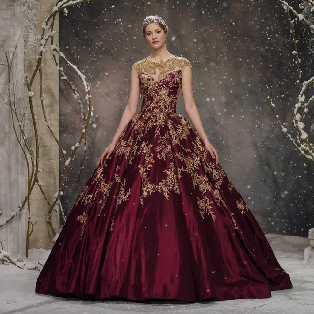 Burgundy red wedding dress with gold accents, radiating sophistication in winter wedding settings.