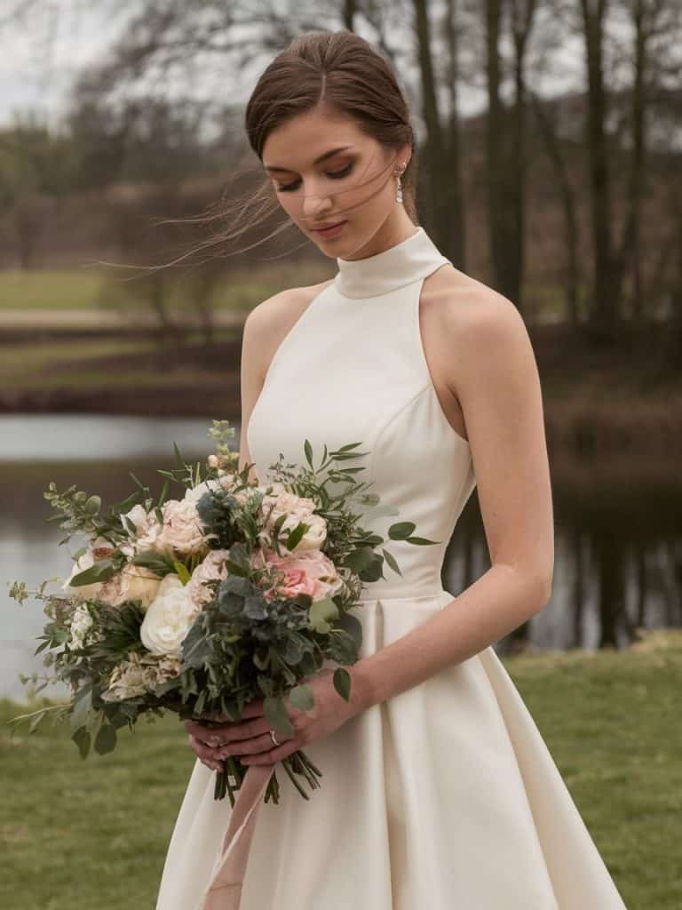 Versatile high-neck wedding dress with an A-line design, offering comfort and timeless elegance for a classic bridal look
