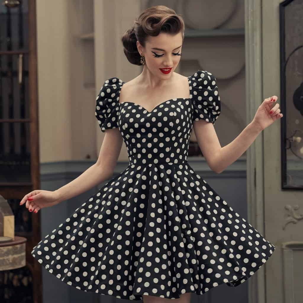 Playful Retro Polka Dot Charm Flare Dress styled with a red belt and vintage kitten heels