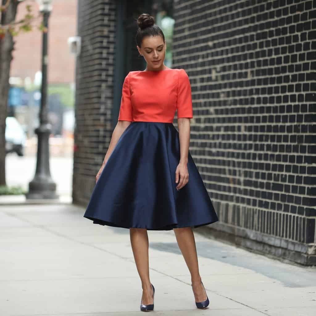 Close-up of a Midi Length Fit and Flare Dress with its flowing skirt and flattering fit, ideal for work or evening wear.