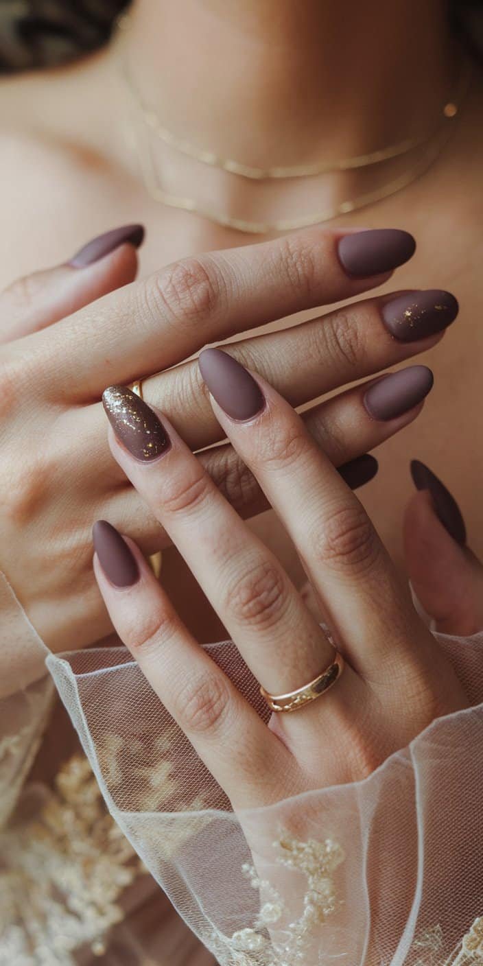 Sophisticated Dusty Mauve wedding nails ideal for medium-to-deep skin tones and autumn or winter ceremonies.