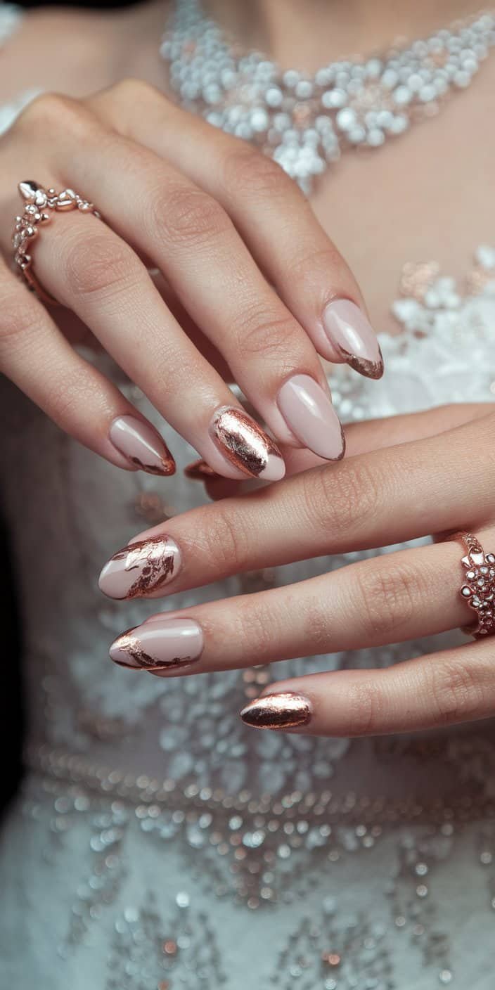 Beautiful rose gold-accented bridal nails, suitable for warm undertones and universally appealing styles.