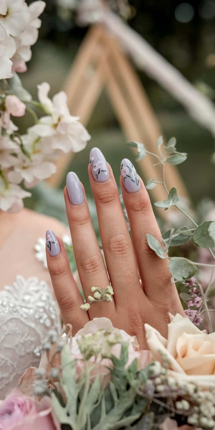 Charming lilac bridal nails featuring miniature floral decals, perfect for garden-themed weddings.