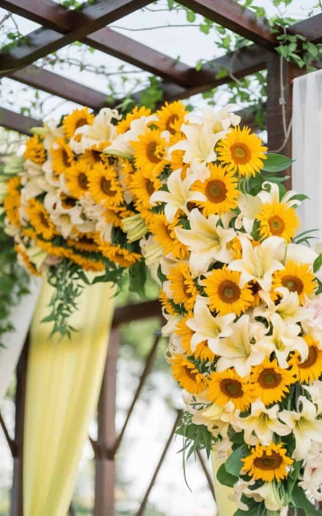 Romantic Wedding Arch Flowers with soft cherry blossoms and tulips in vibrant hues, capturing the essence of spring love.
