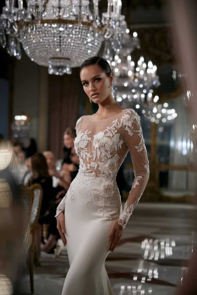 Romantic Valentine's Day dress: White lace overlay dress with intricate floral patterns for elegant date
