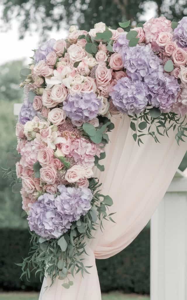 Serene Wedding Arch Flowers in soft pastel shades, evoking romance and tranquility for a fairytale-like wedding.
