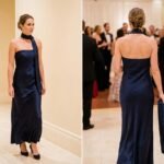 fall wedding guest dress shown in a realistic